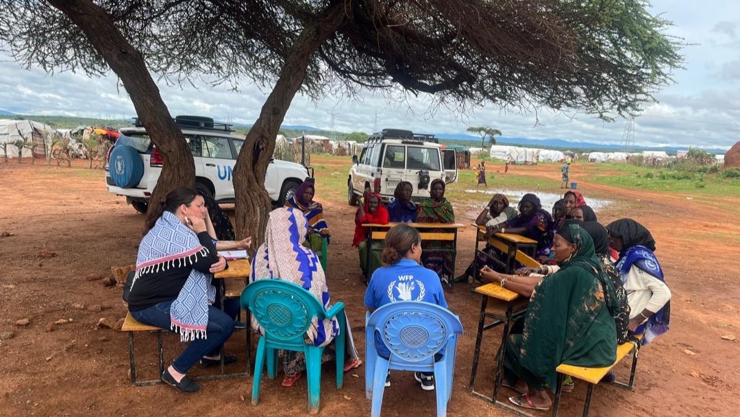 Brooke Bauer (the Alliance) and Tazita (WFP) during a Focus Group Discussion with women in Ethiopia, where they found out that women spend seven hours a day gathering firewood – a heavy workload identified as a barrier to good nutrition for the children.