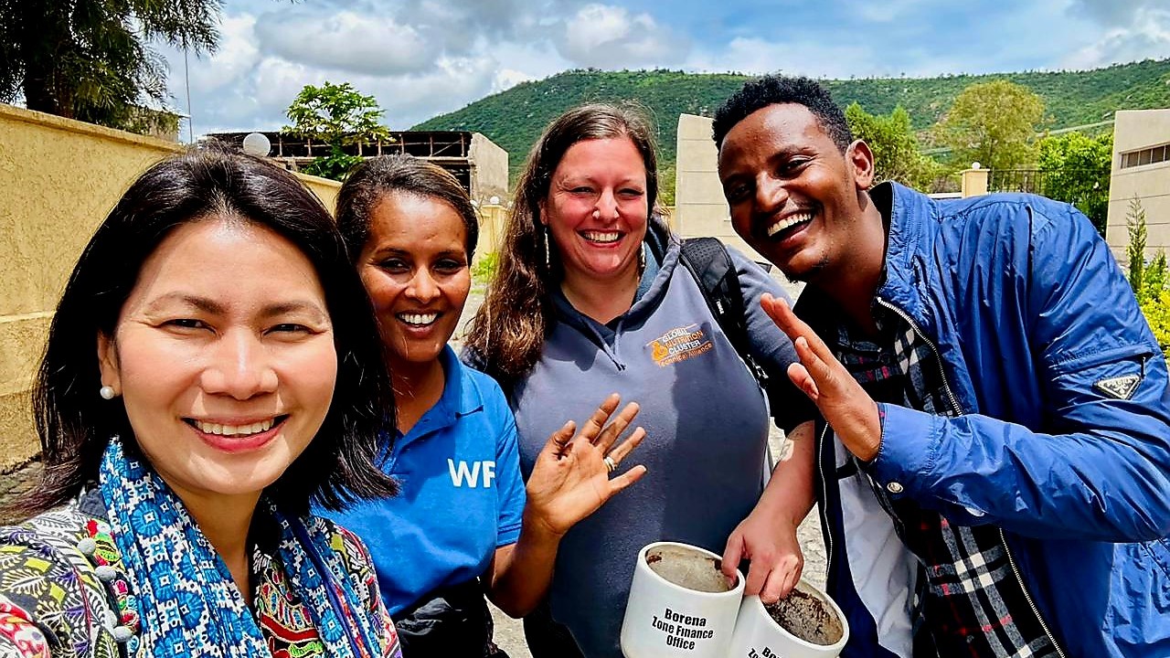 Left to right: Pamela Marie Godoy (UNICEF), Tazita (World Food Programme), Brooke Bauer (GNC Technical Alliance) and Sisay (UNICEF) as they wrap up their regional action planning workshop in the Borena region,  Ethiopia.